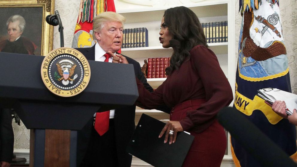 PHOTO: President Donald Trump listens to Director of Communications for the White House Public Liaison Office Omarosa Manigault during an event in the Oval Office of the White House in this Oct. 24, 2017 file photo in Washington.
