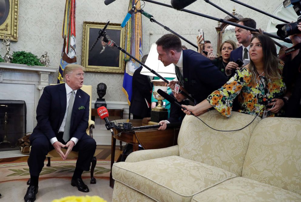 PHOTO: President Donald Trump talks to the press during a meeting in the Oval Office of the White House, March 14, 2019.