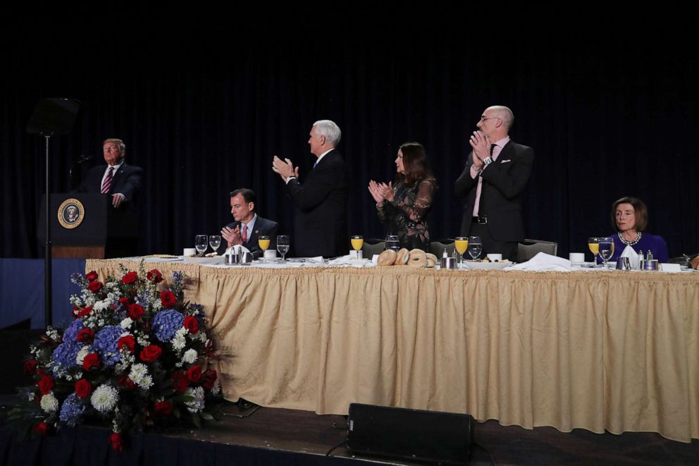 PHOTO: President Donald Trump delivers a speech as Vice President Mike Pence, his wife Karen Pence and House Speaker Nancy Pelosi look on at the National Prayer Breakfast in Washington, Feb. 6, 2020.