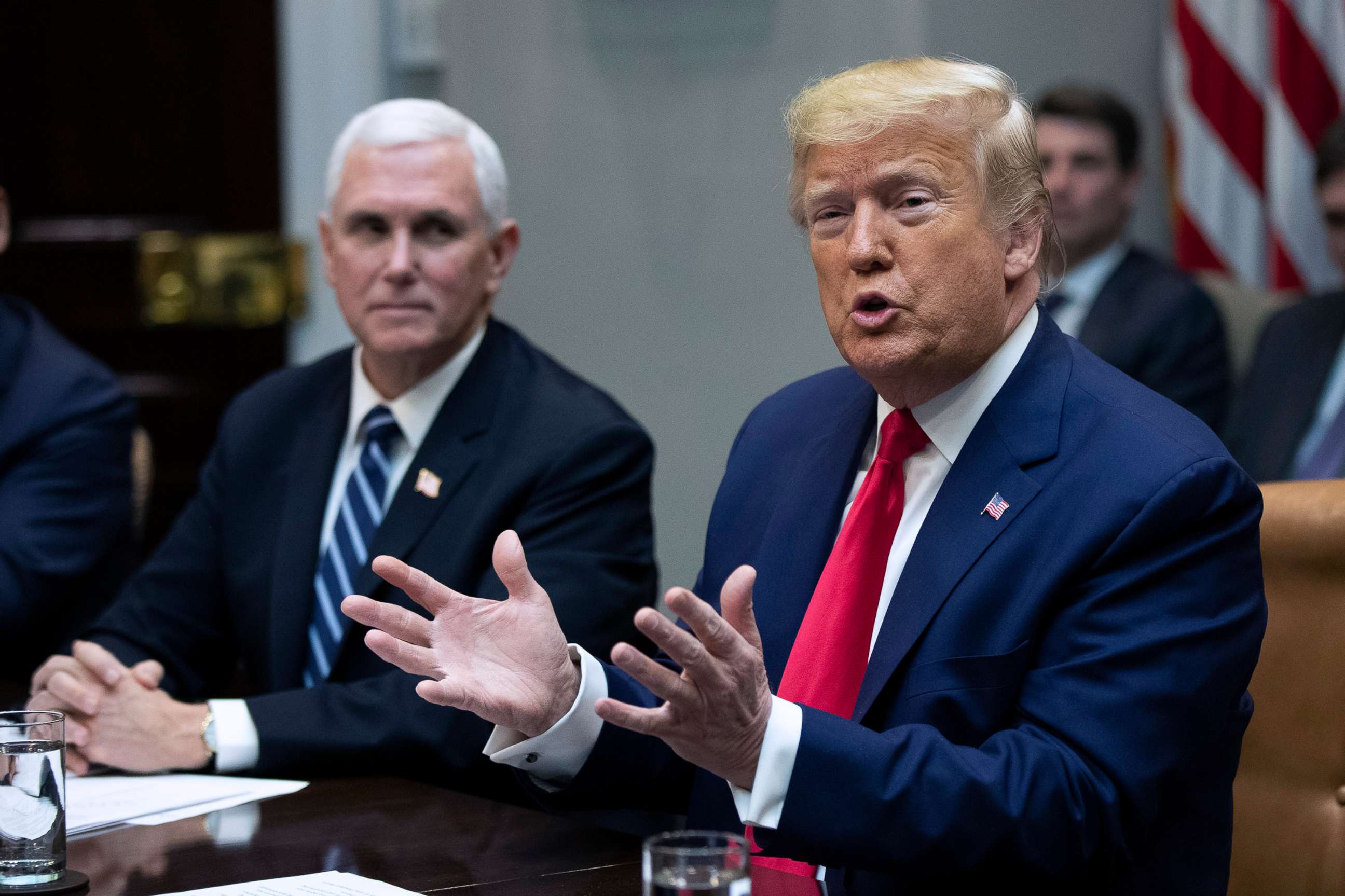 PHOTO: President Donald Trump with Vice President Mike Pence, speaks during a coronavirus briefing with Airline CEOs in the Roosevelt Room of the White House, March 4, 2020.