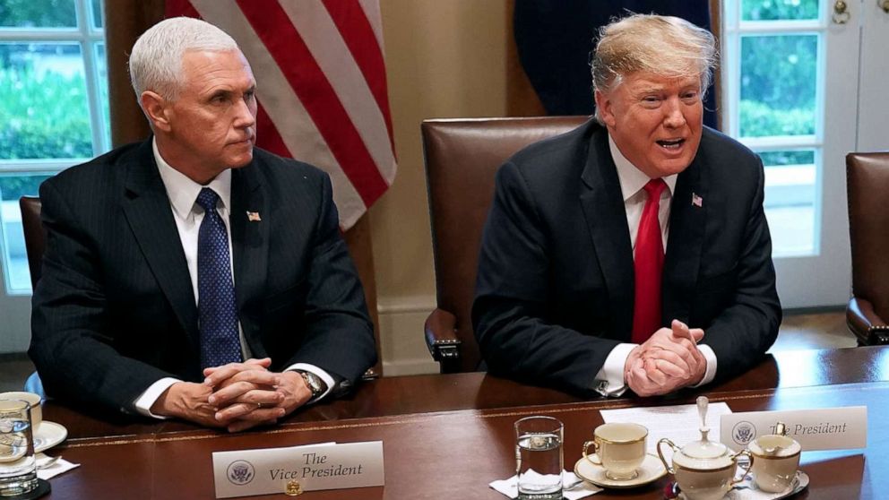 PHOTO: Vice President Mike Pence listens to President Donald Trump during a bilateral meeting in the Cabinet Room at the White House, April 2, 2019, in Washington, DC.