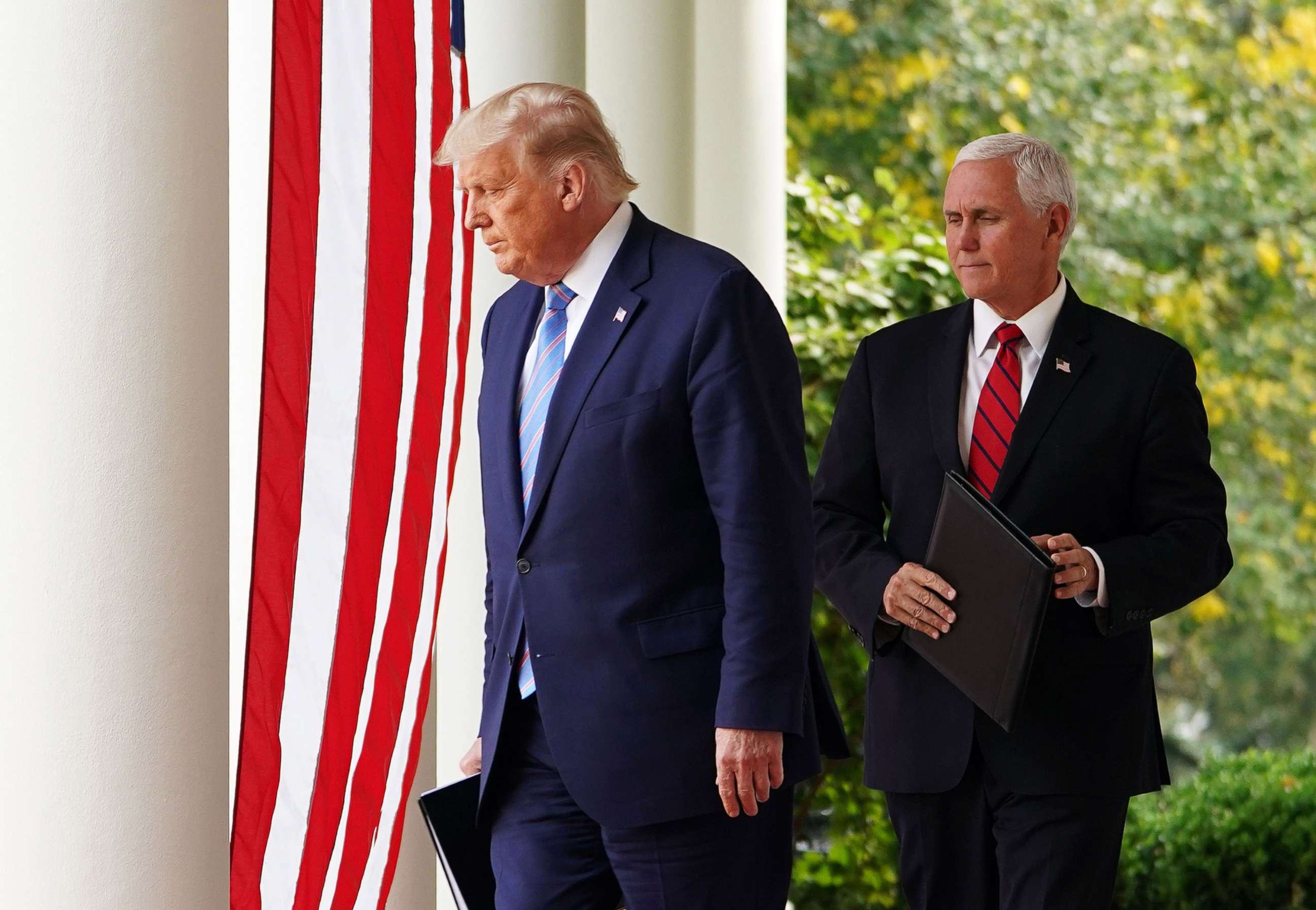 PHOTO:President Donald Trump and Vice President Mike Pence arrive in the Rose Garden to speak on Covid-19 testing at the White House in Washington, D.C., Sept. 28, 2020.