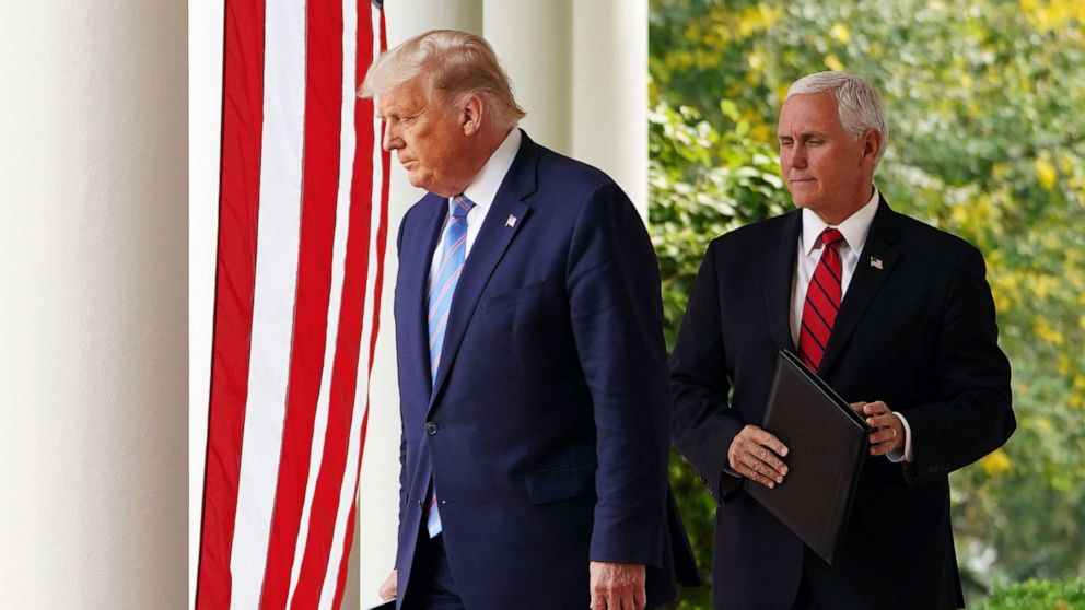 PHOTO:President Donald Trump and Vice President Mike Pence arrive in the Rose Garden to speak on Covid-19 testing at the White House in Washington, D.C., Sept. 28, 2020.