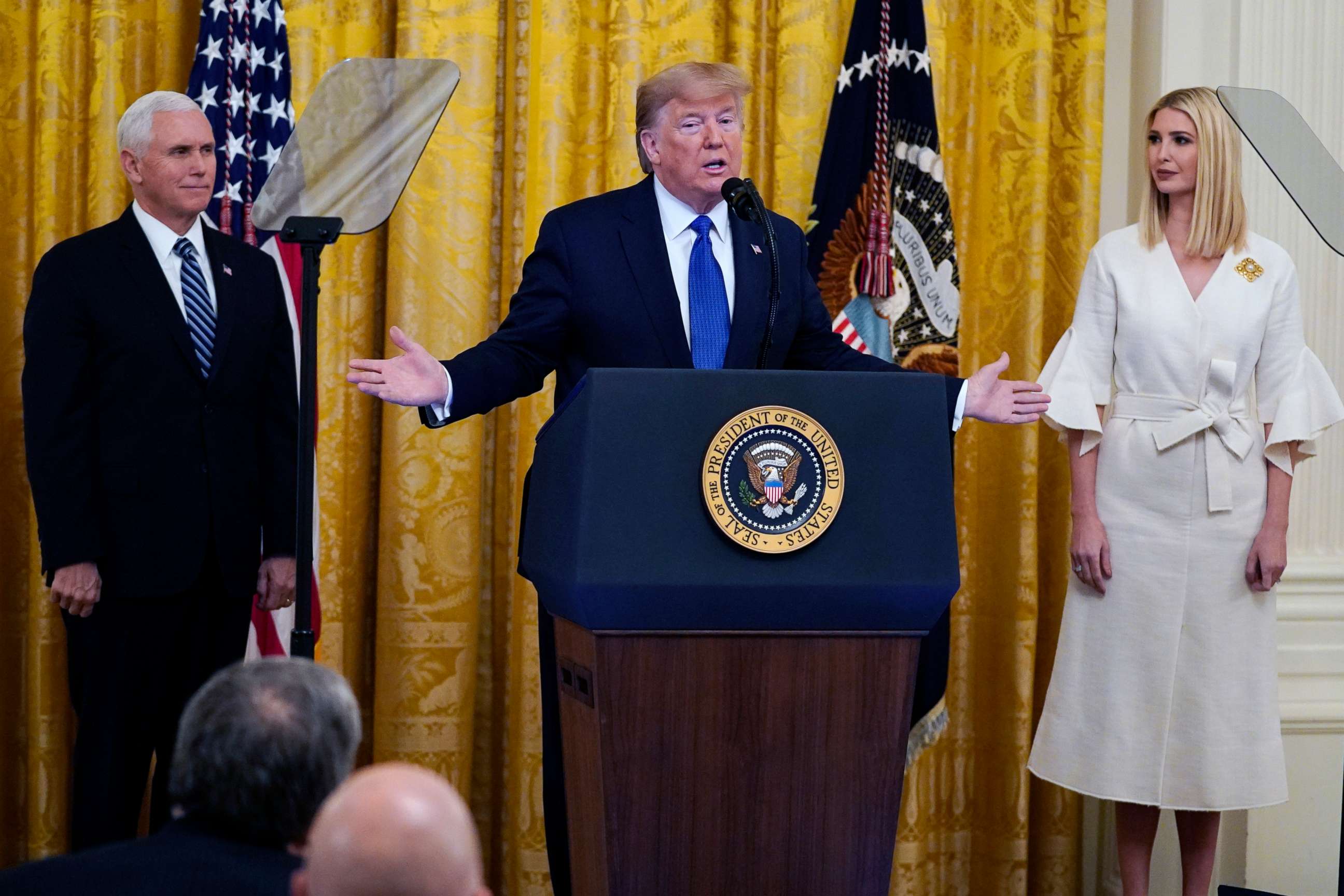 PHOTO: President Donald Trump speaks during an event on human trafficking in the East Room of the White House, Jan. 31, 2020, in Washington, as Vice President Mike Pence, left, and senior adviser to the President, Ivanka Trump,  look on.  