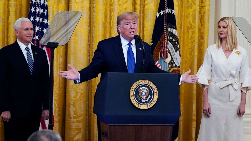 PHOTO: President Donald Trump speaks during an event on human trafficking in the East Room of the White House, Jan. 31, 2020, in Washington, as Vice President Mike Pence, left, and senior adviser to the President, Ivanka Trump,  look on.  