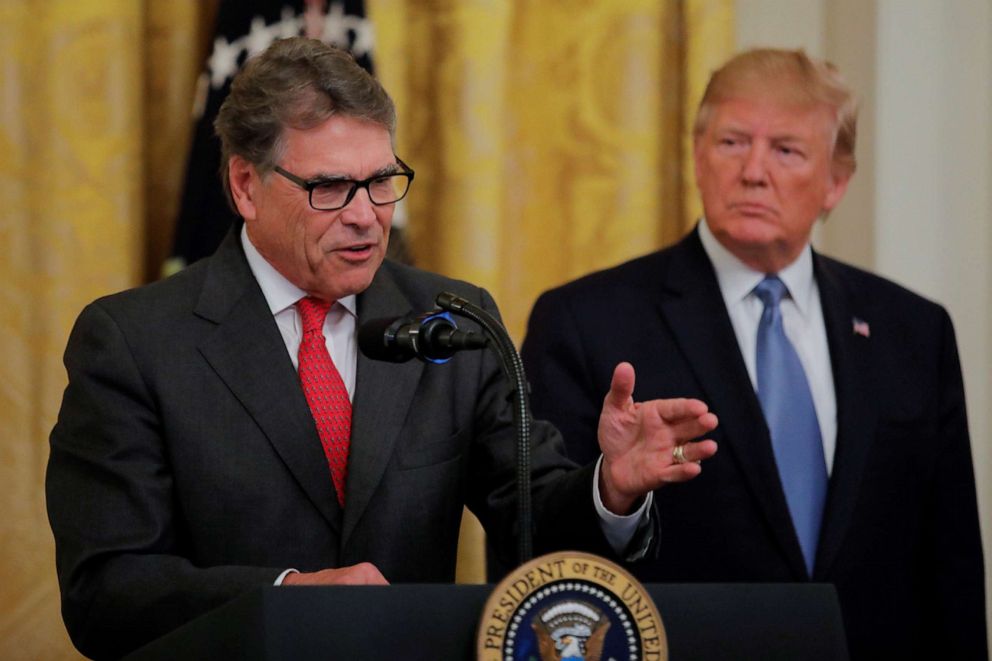PHOTO: A file photo of President Donald Trump listening to Energy Secretary Rick Perry while he speaks during an event in the East Room of the White House in Washington, July 8, 2019.