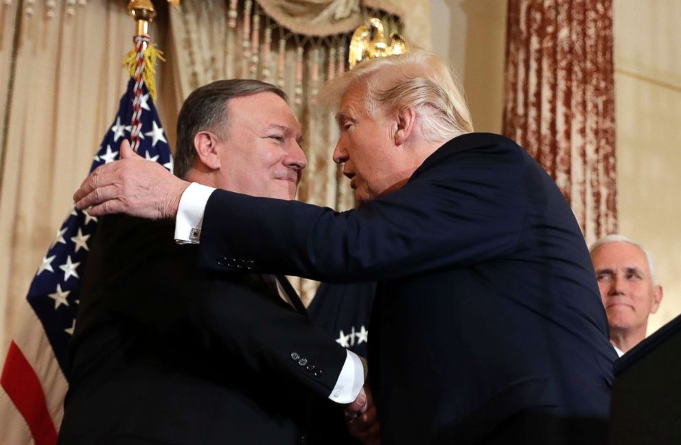 PHOTO: President Donald Trump greets Secretary of State Mike Pompeo during a ceremonial swearing at the State Department, May 2, 2018, in Washington. 