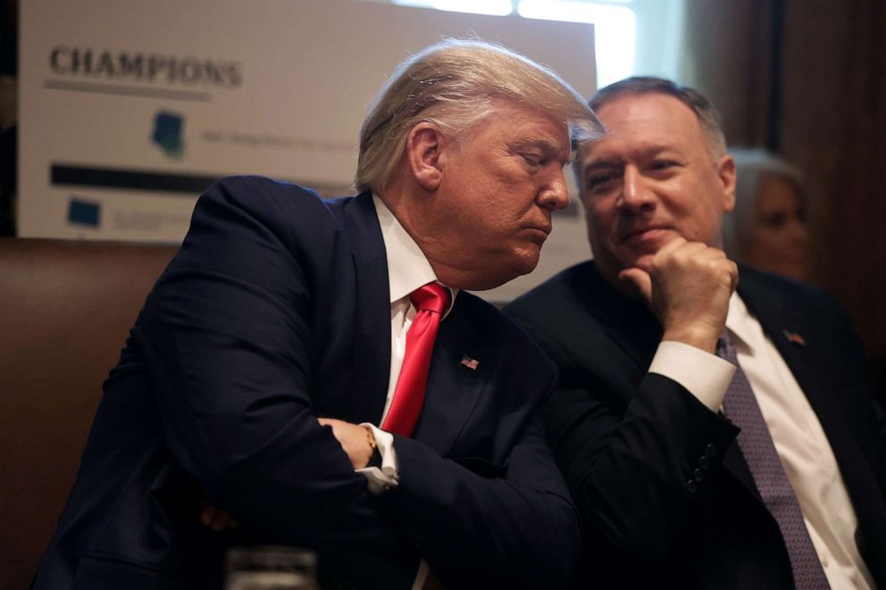 PHOTO: President Donald Trump listens to Secretary of State Mike Pompeo during a cabinet meeting at the Cabinet Room of the White House October 21, 2019, in Washington, DC.