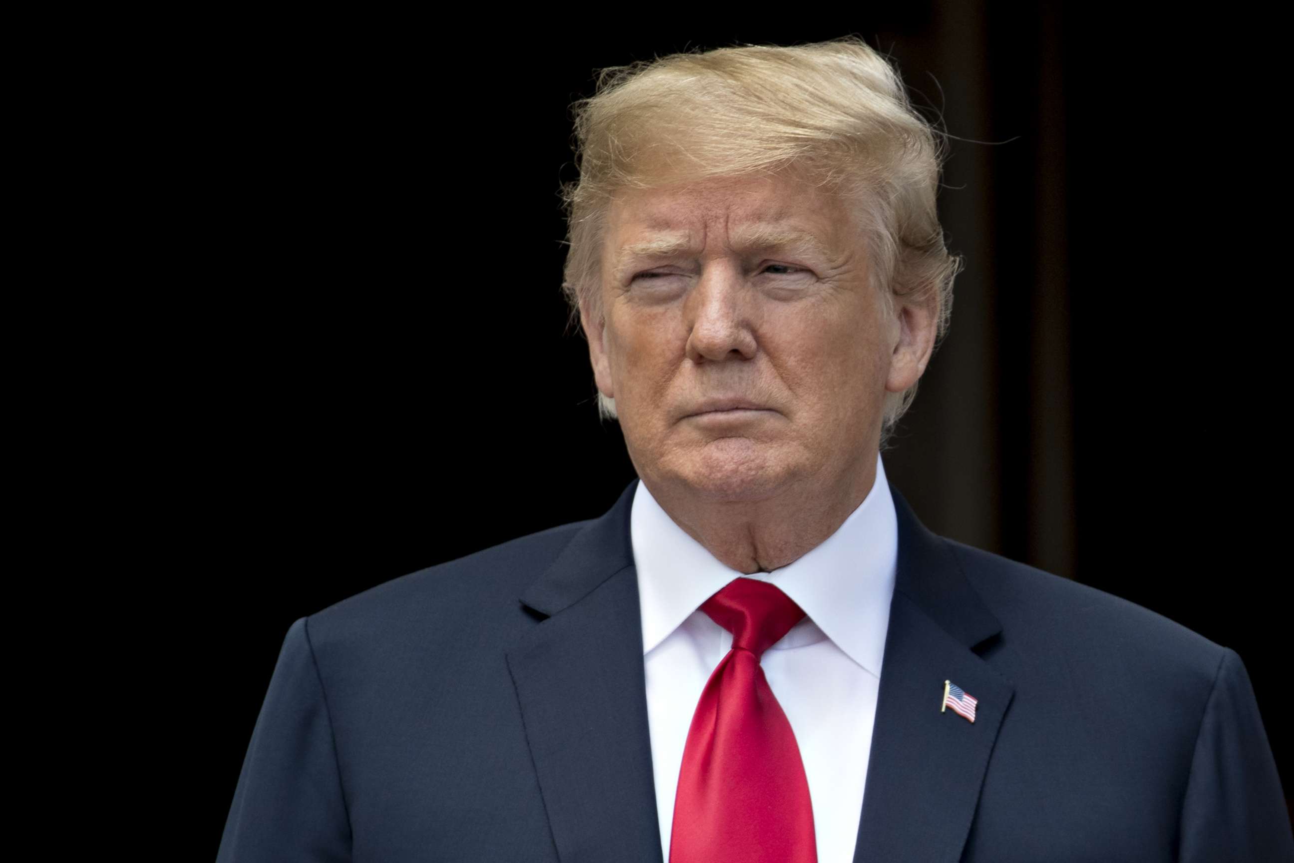 PHOTO: President Donald Trump waits to greet King Abdullah II of Jordan and Rania Al-Abdullah, Queen of Jordan, not pictured, at the South Portico of the White House in Washington, June 25, 2018.