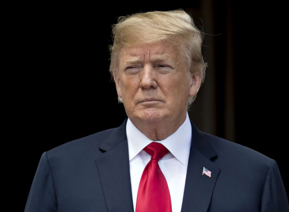   PHOTO: President Donald Trump waits to greet King Abdullah II of Jordan and Rania Al-Abdullah, Queen of Jordan, unrepresented, at the South Gate of the White House in Washington, DC, June 25, 2018. 