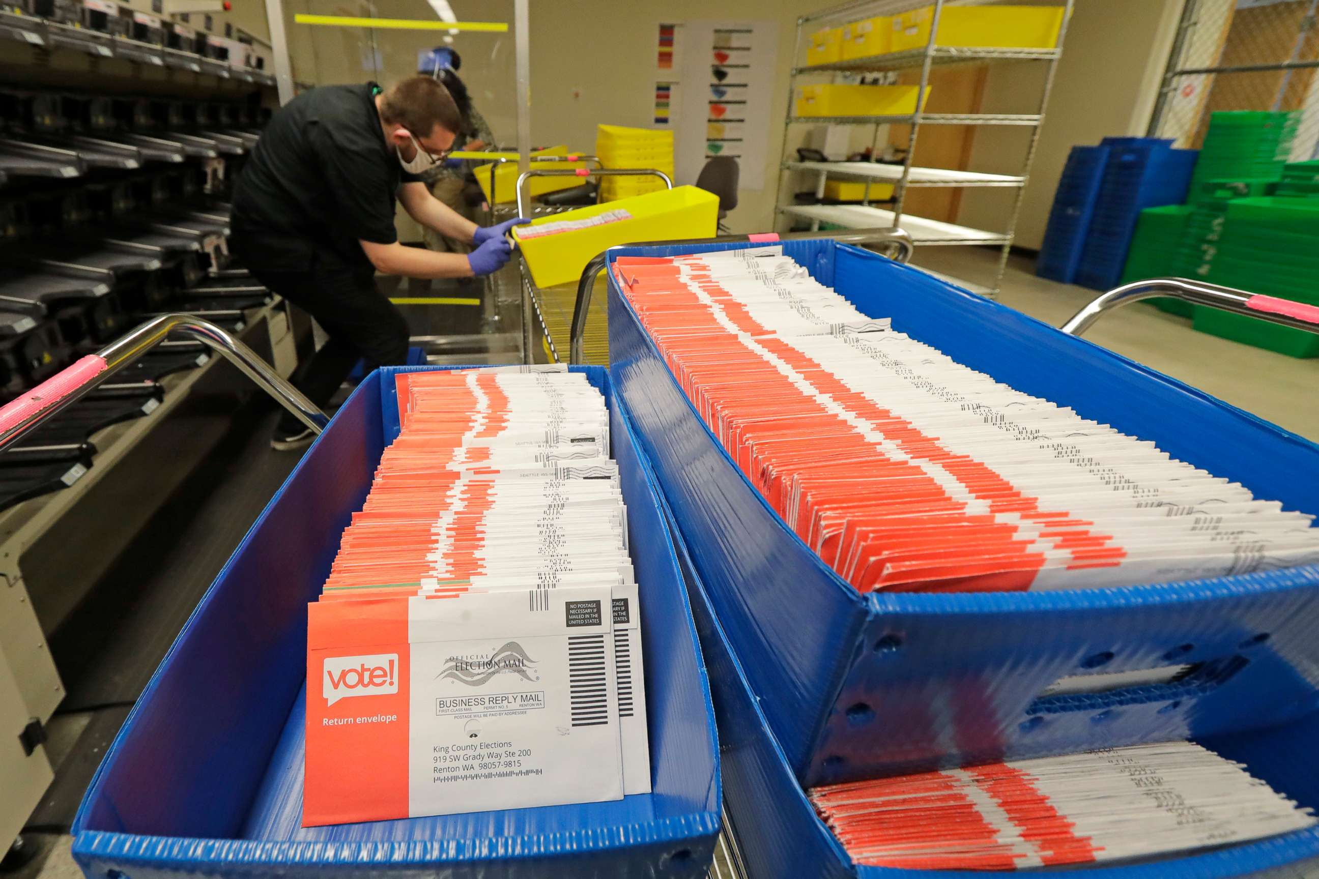 PHOTO: Vote-by-mail ballots await sorting in trays at the King County Elections headquarters in Renton, Wash.,Aug.5, 2020
