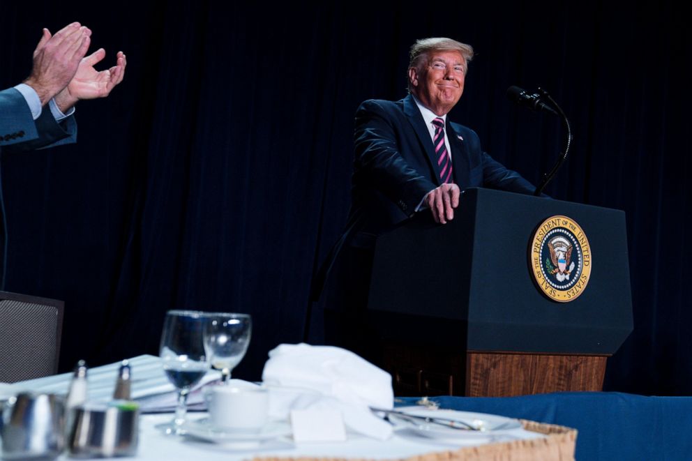 PHOTO: President Donald Trump smiles as he arrives to speak at the 68th annual National Prayer Breakfast, at the Washington Hilton, Feb. 6, 2020, in Washington.