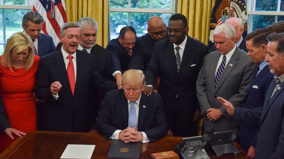 PHOTO: Donald J. Trump, backed by faith leaders, declared a National Day of Prayer for victims of Hurrican Harvey in the Oval Office of the White House on Sept. 1, 2017, in Washington, DC. 