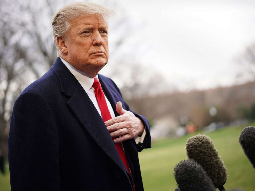 PHOTO: President Donald Trump speaks to the press before boarding Marine One as he departs from the South Lawn of the White House, March 22, 2019.