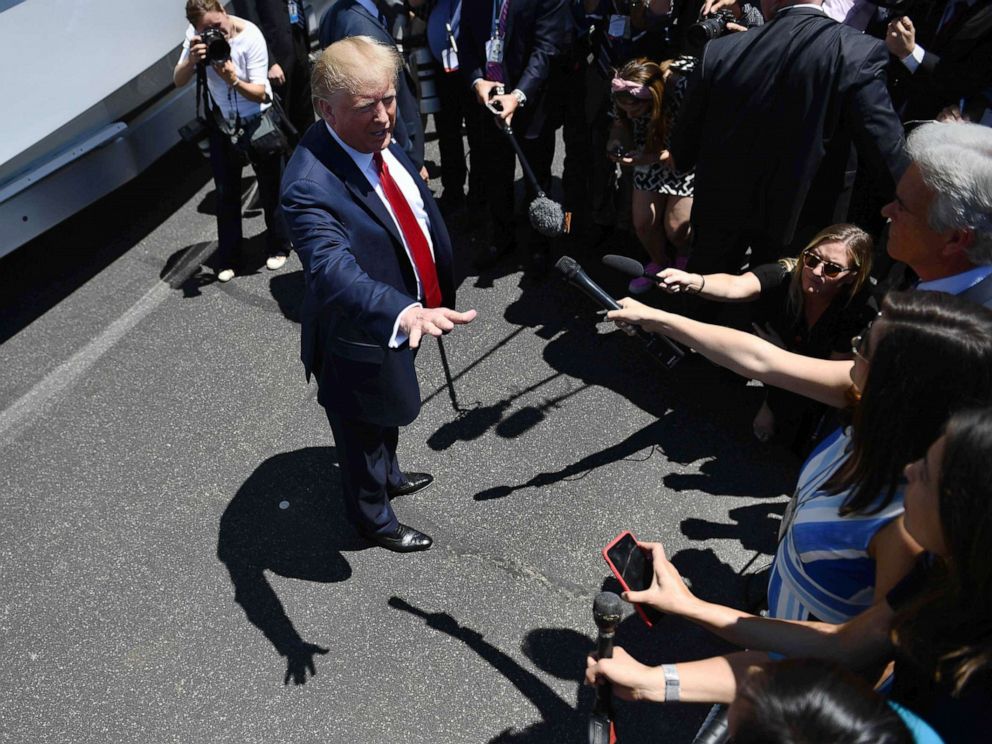 PHOTO: President Donald talks to members of the press during an event on the South Lawn at the White House, July 15. 2019.