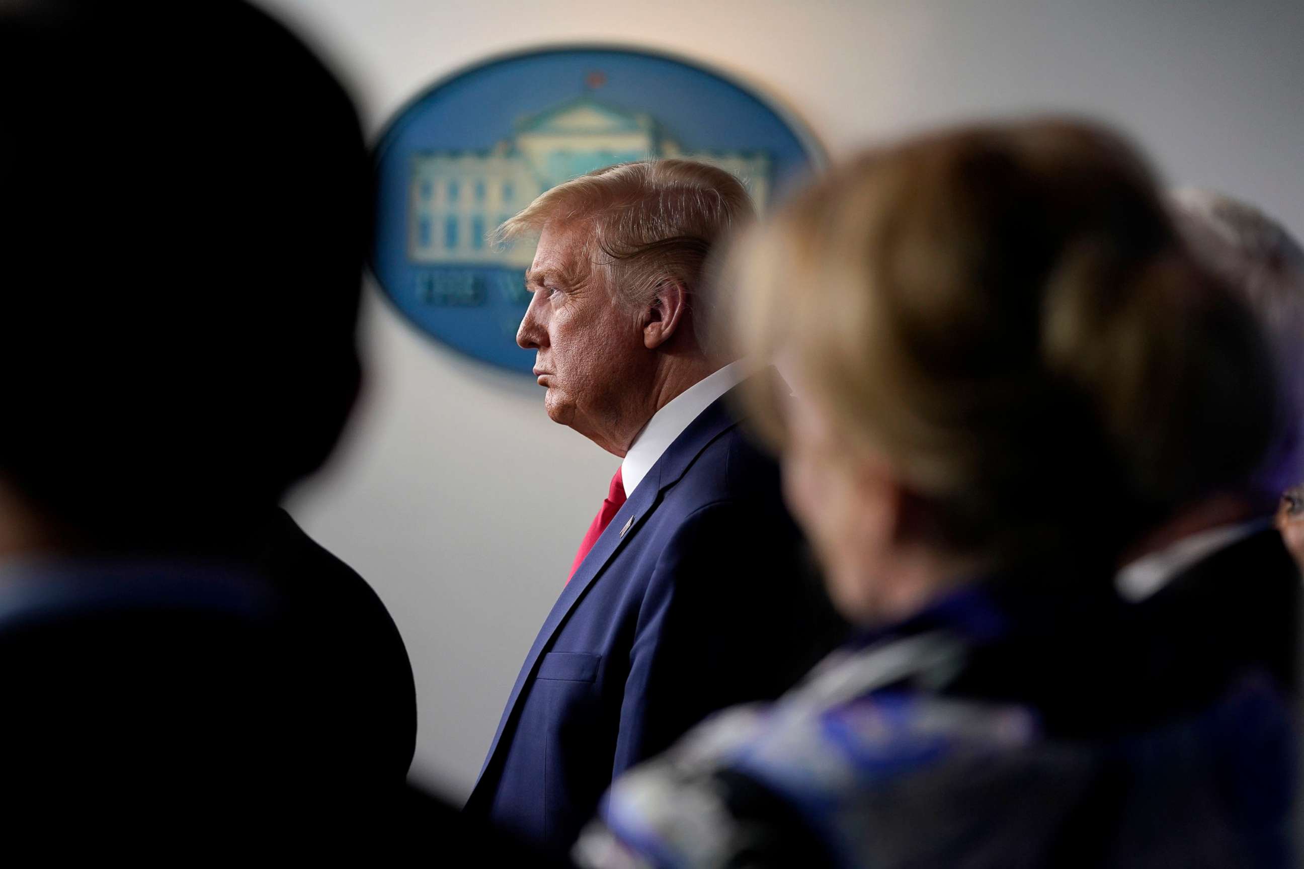 PHOTO: President Donald Trump listens during press briefing with the Coronavirus Task Force, at the White House, March 18, 2020.