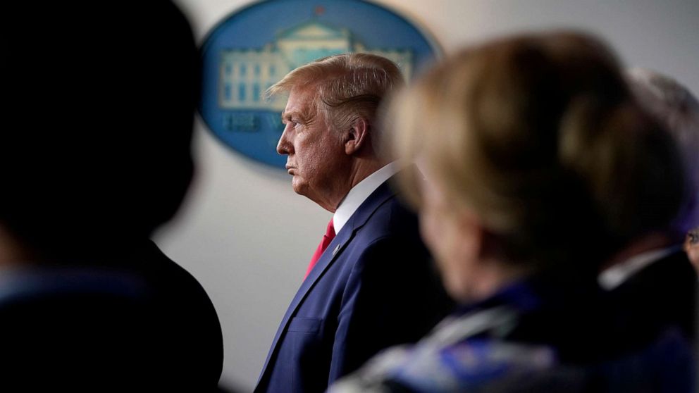 PHOTO: President Donald Trump listens during press briefing with the Coronavirus Task Force, at the White House, March 18, 2020.