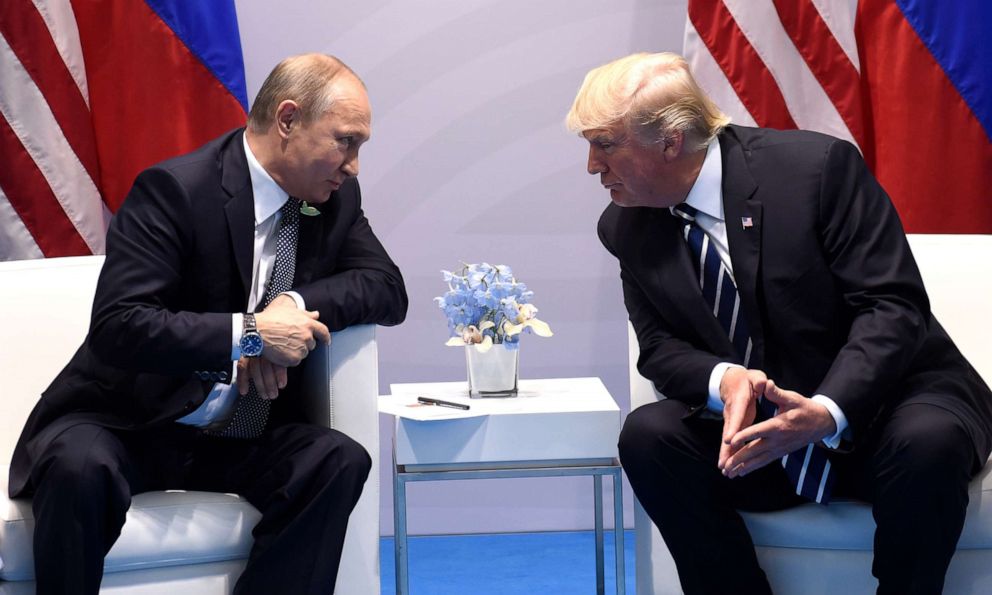 PHOTO: US President Donald Trump and Russia's President Vladimir Putin hold a meeting on the sidelines of the G20 Summit in Hamburg, Germany, on July 7, 2017.