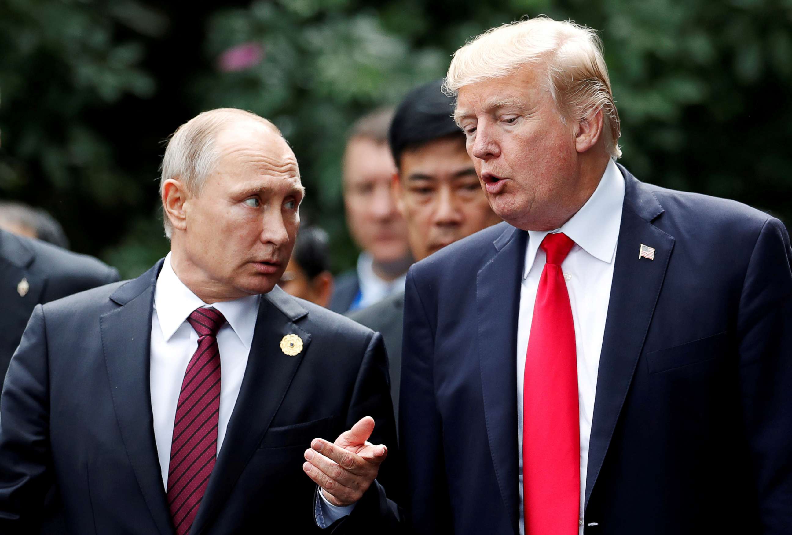 PHOTO: U.S. President Donald Trump and Russia's President Vladimir Putin talk during the family photo session at the APEC Summit in Danang, Vietnam, November 11, 2017.