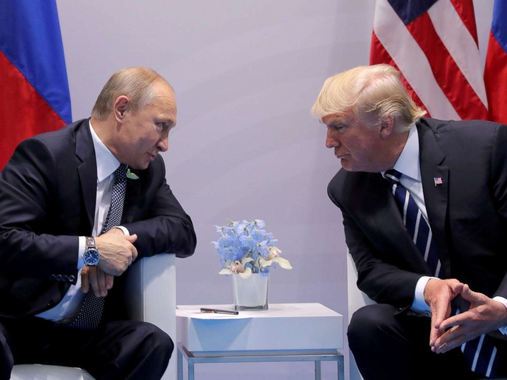 PHOTO: FILE PHOTO: Russias President Vladimir Putin talks to U.S. President Donald Trump during their bilateral meeting at the G20 summit in Hamburg, Germany, July 7, 2017.