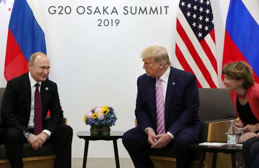 PHOTO: Russian President Vladimir Putin and US President Donald Trump hold a meeting on the sidelines of the G20 summit in Osaka, June 28, 2019.