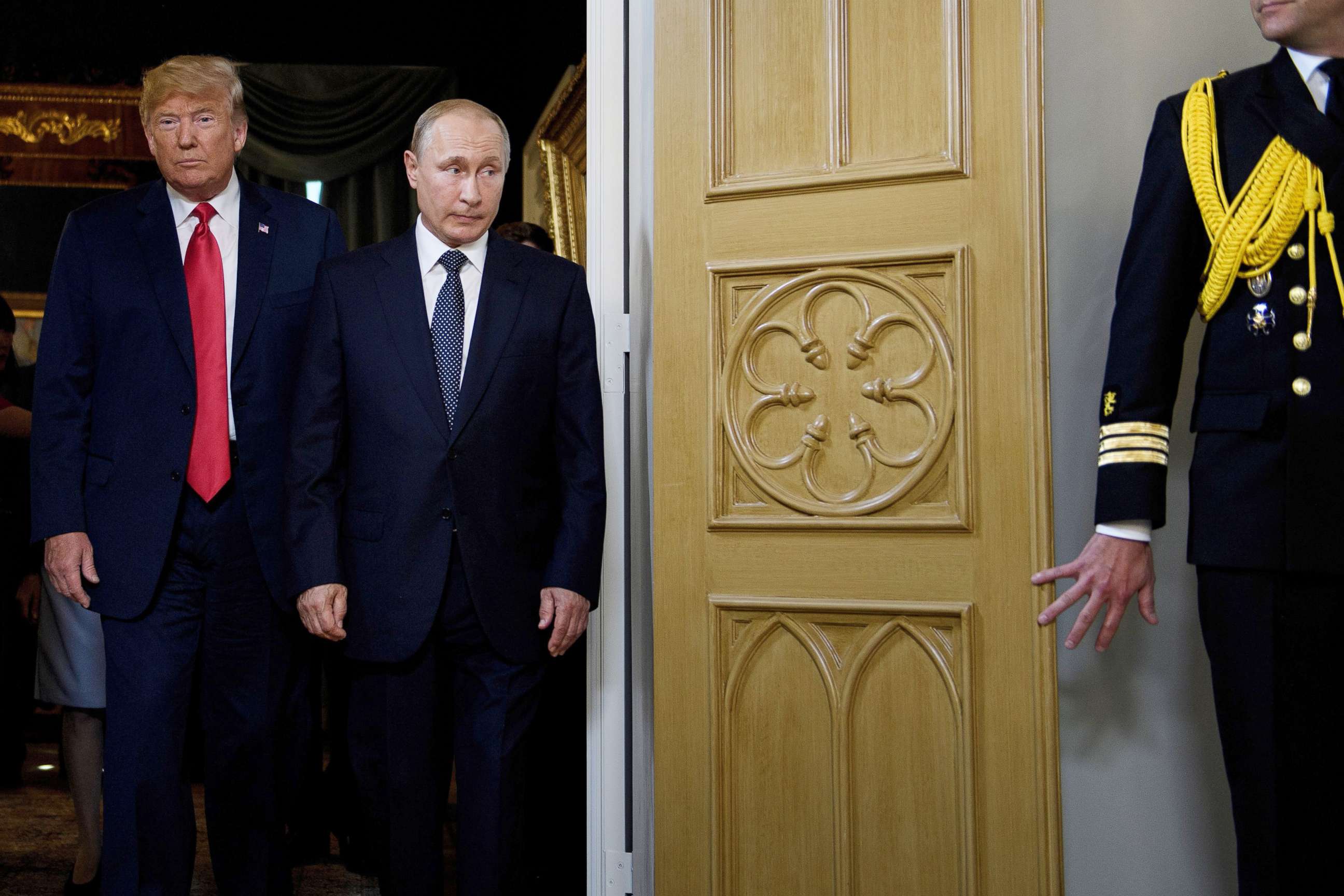 PHOTO: President Donald Trump (L) and Russian President Vladimir Putin arrive for a meeting in Helsinki, July 16, 2018.