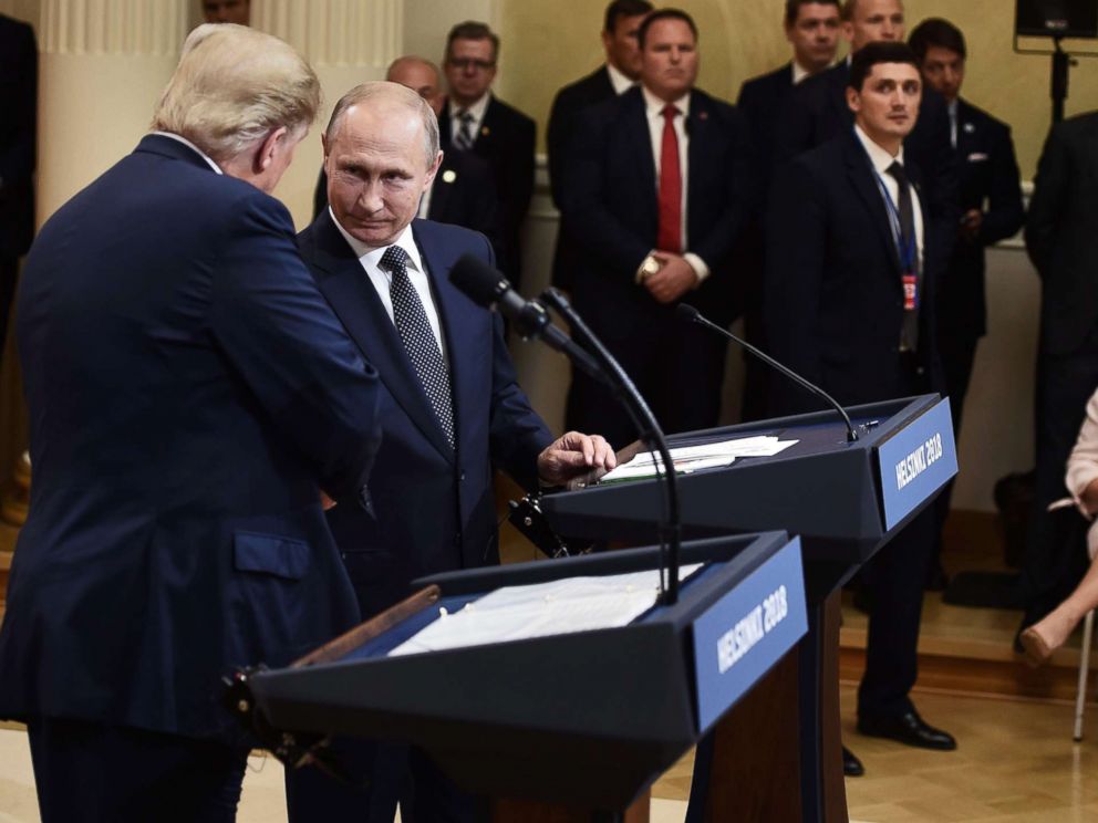 PHOTO: President Donald Trump and Russias President Vladimir Putin shake hands during a joint press conference after a meeting at the Presidential Palace in Helsinki, Finland, July 16, 2018.