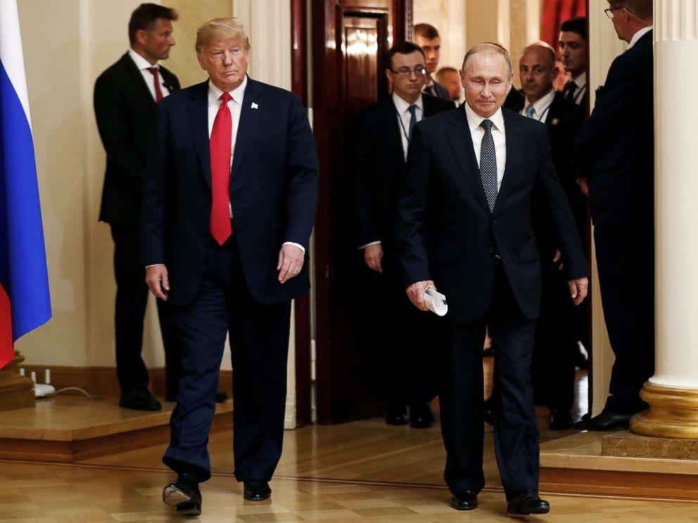 PHOTO: President Donald Trump and Russias President Vladimir Putin arrive to hold a joint news conference after their meeting in Helsinki, July 16, 2018.