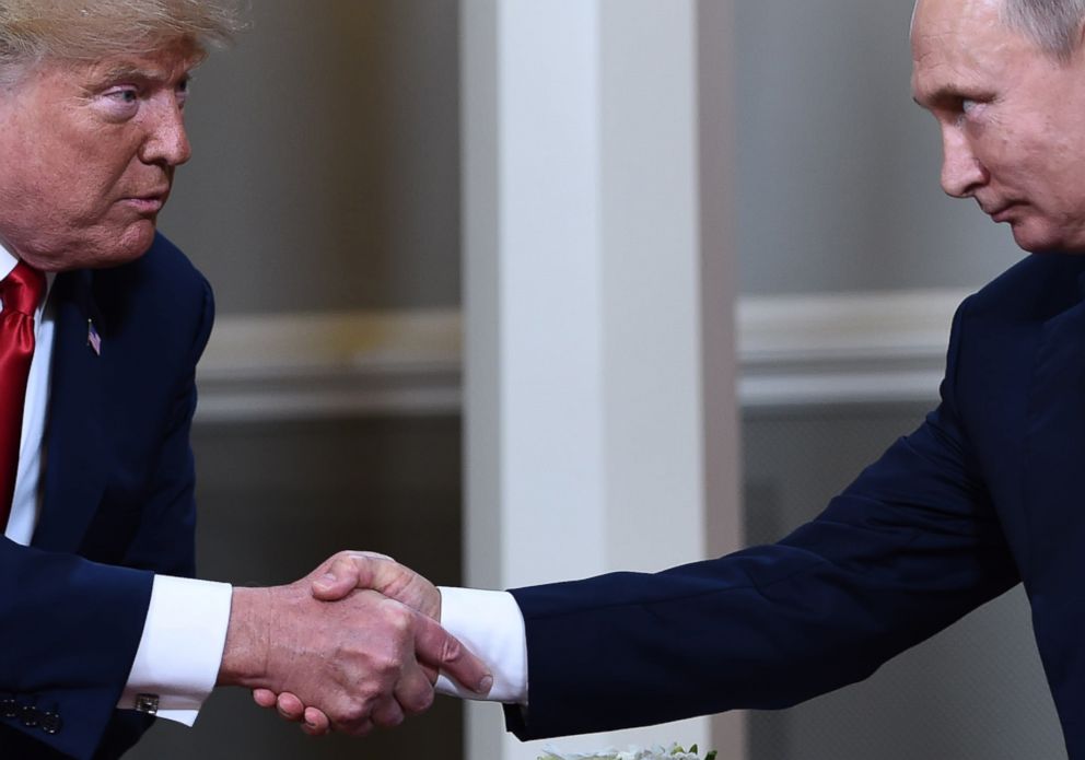 PHOTO: President Donald Trump and Russian President Vladimir Putin shake hands ahead a meeting in Helsinki, July 16, 2018.