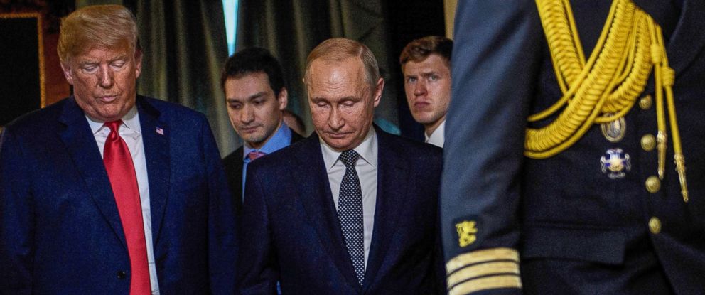 PHOTO: President Donald Trump and Russias President Vladimir Putin arrive for a meeting at Finlands Presidential Palace on July 16, 2018 in Helsinki.