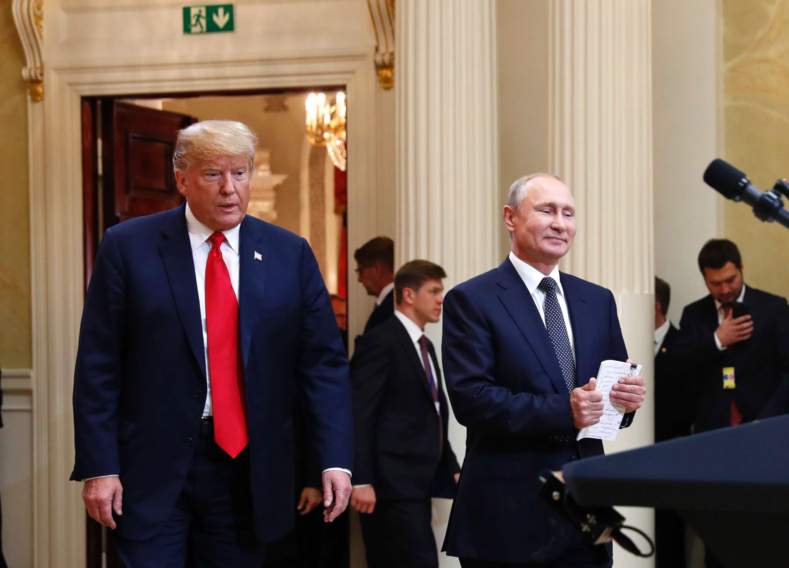 PHOTO: President Donald Trump and Russian President Vladimir Putin arrive for a press conference at the Presidential Palace in Helsinki, Finland, July 16, 2018.