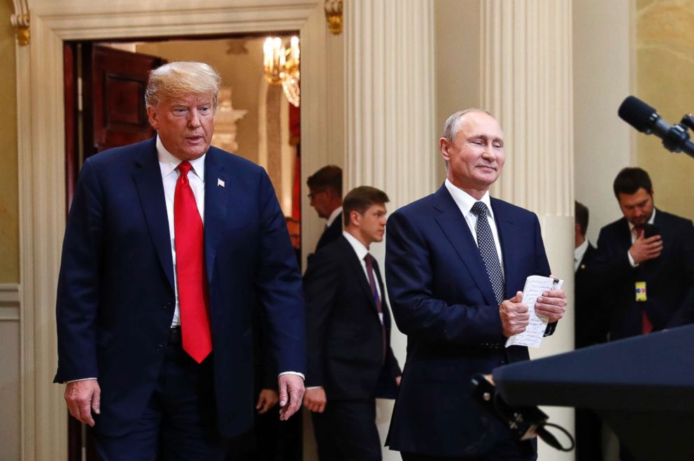 PHOTO: President Donald Trump and Russian President Vladimir Putin arrive for a press conference at the Presidential Palace in Helsinki, Finland, July 16, 2018.
