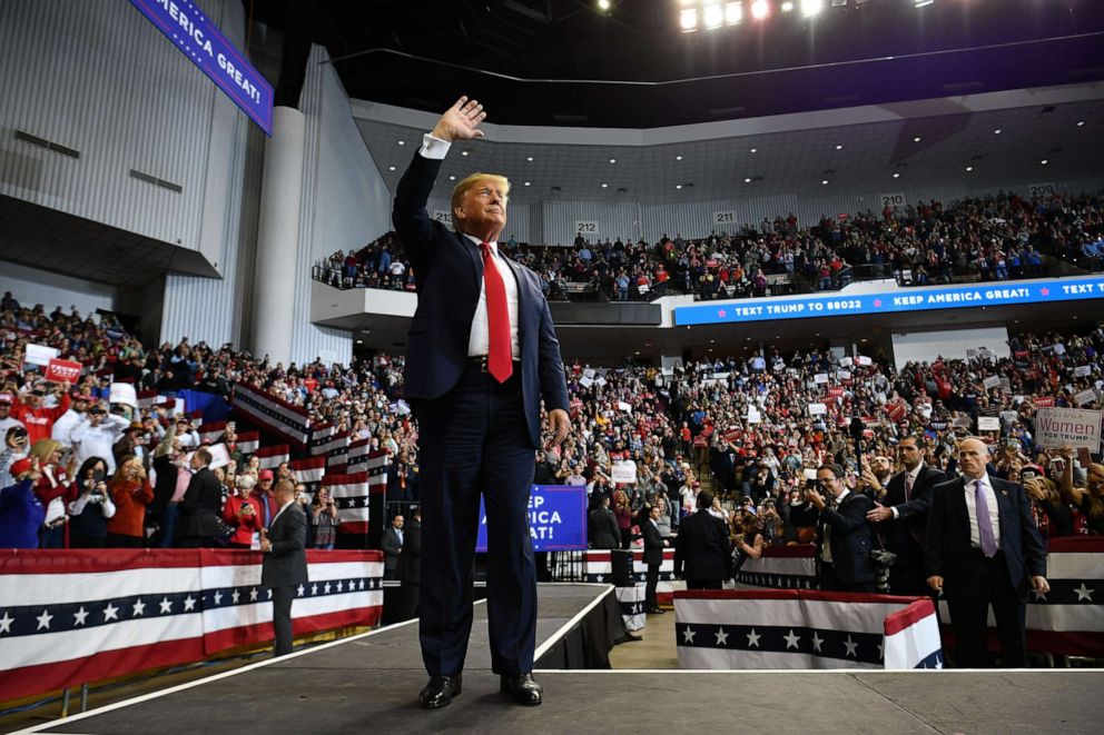 PHOTO: US President Donald Trump waves to supporters as he arrives for a "Keep America Great" rally in Bossier City, Louisiana on November 14, 2019.