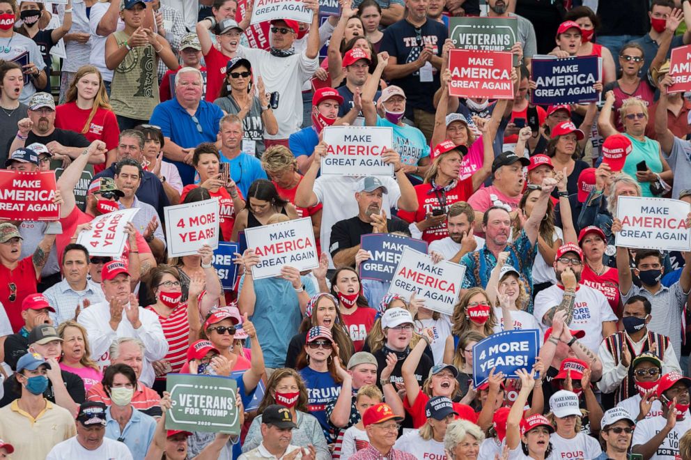 PHOTO: Fans cheer during a Make America Great Again Rally for President Trump at the Smith Reynolds Regional Airport in Winston-Salem, NC., Sept. 8, 2020.