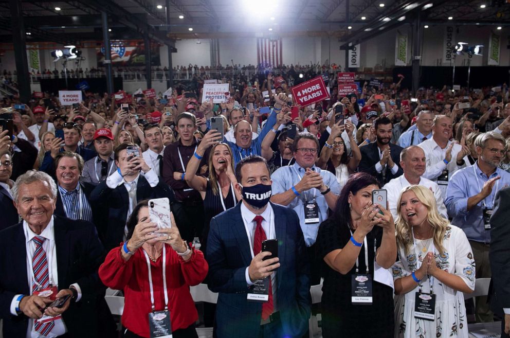 PHOTO: People cheer as President Donald Trump arrives for an indoor campaign rally at Xtreme Manufacturing in Henderson, a suburb of Las Vegas, Nev., Sept. 13, 2020.