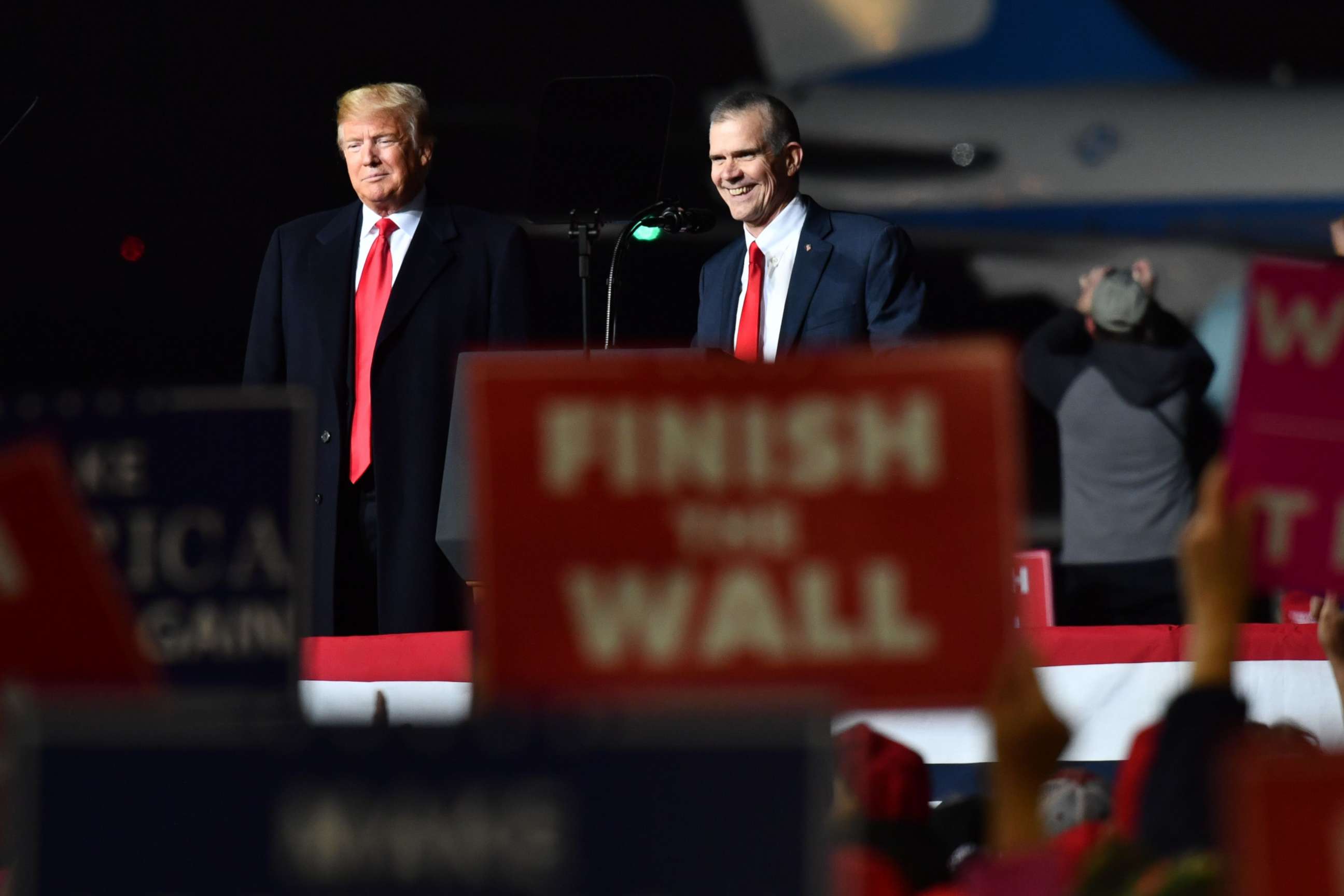PHOTO: President Donald Trump and Matt Rosendale (R), Republican Auditor and candidate for the US Senate speaks during a "Make America Great" rally in Missoula, Mont., Oct. 18, 2018.