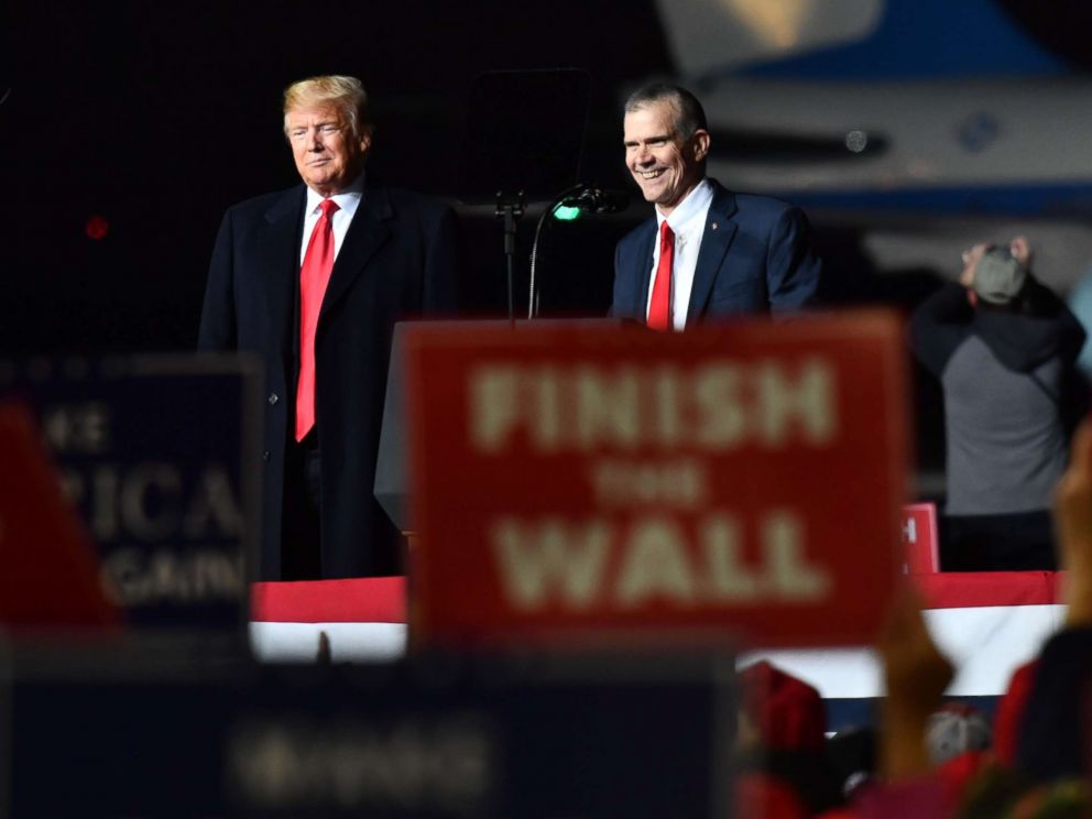 PHOTO: President Donald Trump and Matt Rosendale (R), Republican Auditor and candidate for the US Senate speaks during a Make America Great rally in Missoula, Mont., Oct. 18, 2018.
