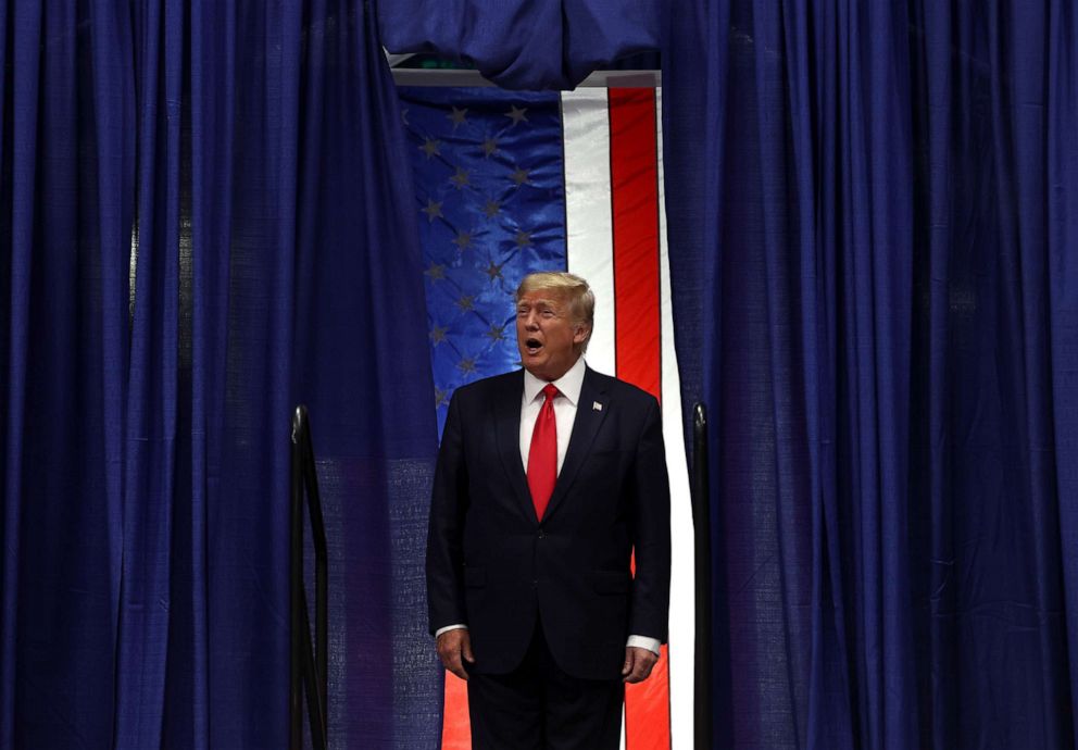 PHOTO: Former President Donald Trump walks on stage during a "Save America" rally at Alaska Airlines Center on July 9, 2022, in Anchorage, Alaska.