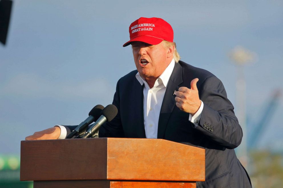 PHOTO: Donald Trump speaks during a rally aboard the Battleship USS Iowa in Los Angeles, while wearing a 'Make America Great Again' hat, Sept. 15, 2015.