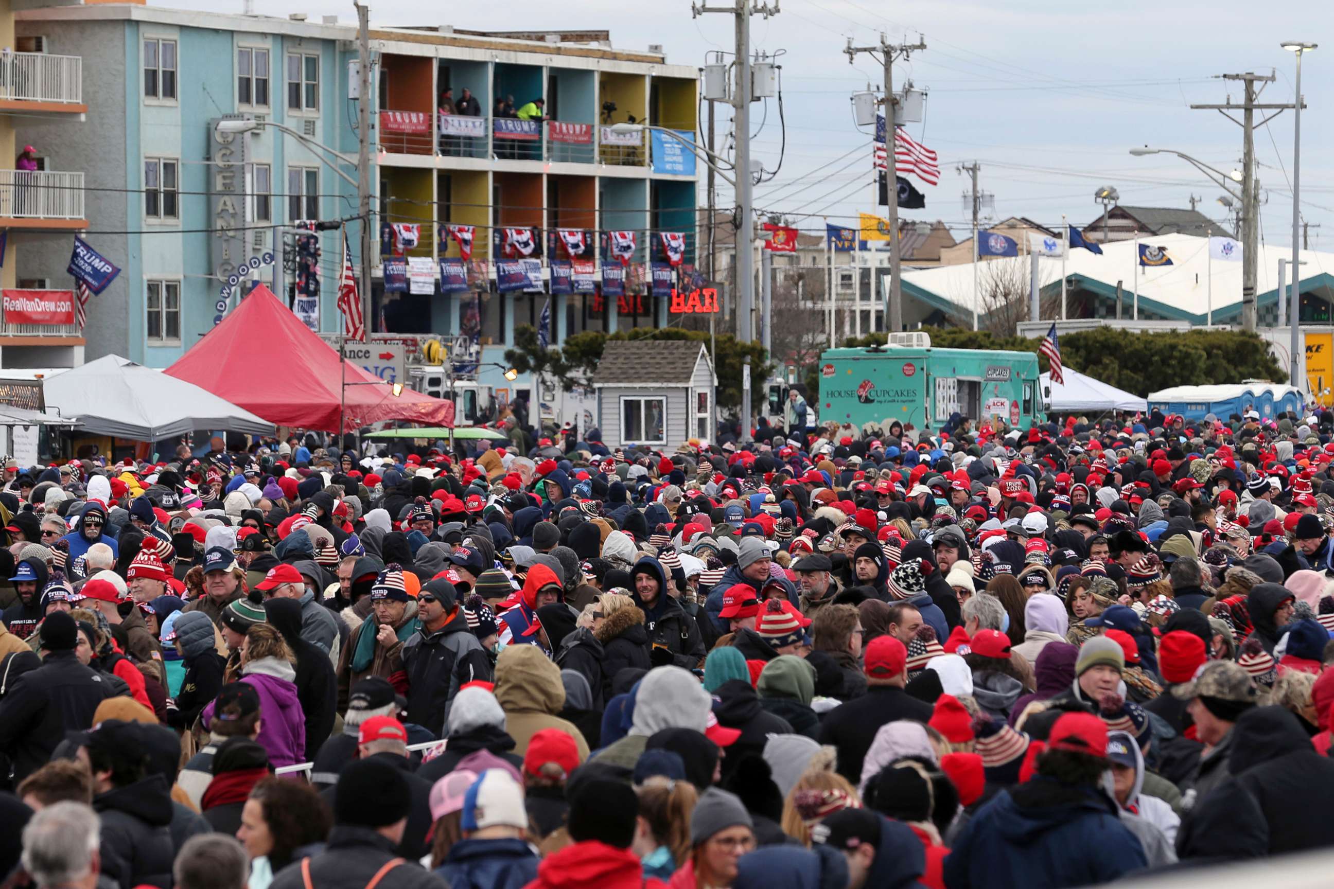 PHOTO: A crowd stands in the cold in front of the Wildwoods Convention Center as they wait to enter for a campaign rally with President Donald Trump, Jan. 28, 2020, in Wildwood, N.J.