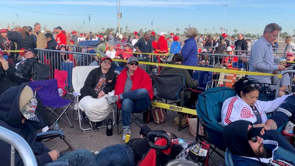 PHOTO: Supporters of President Trump wait on line for the start of a rally in Phoenix, Ariz., Feb. 19, 2020.