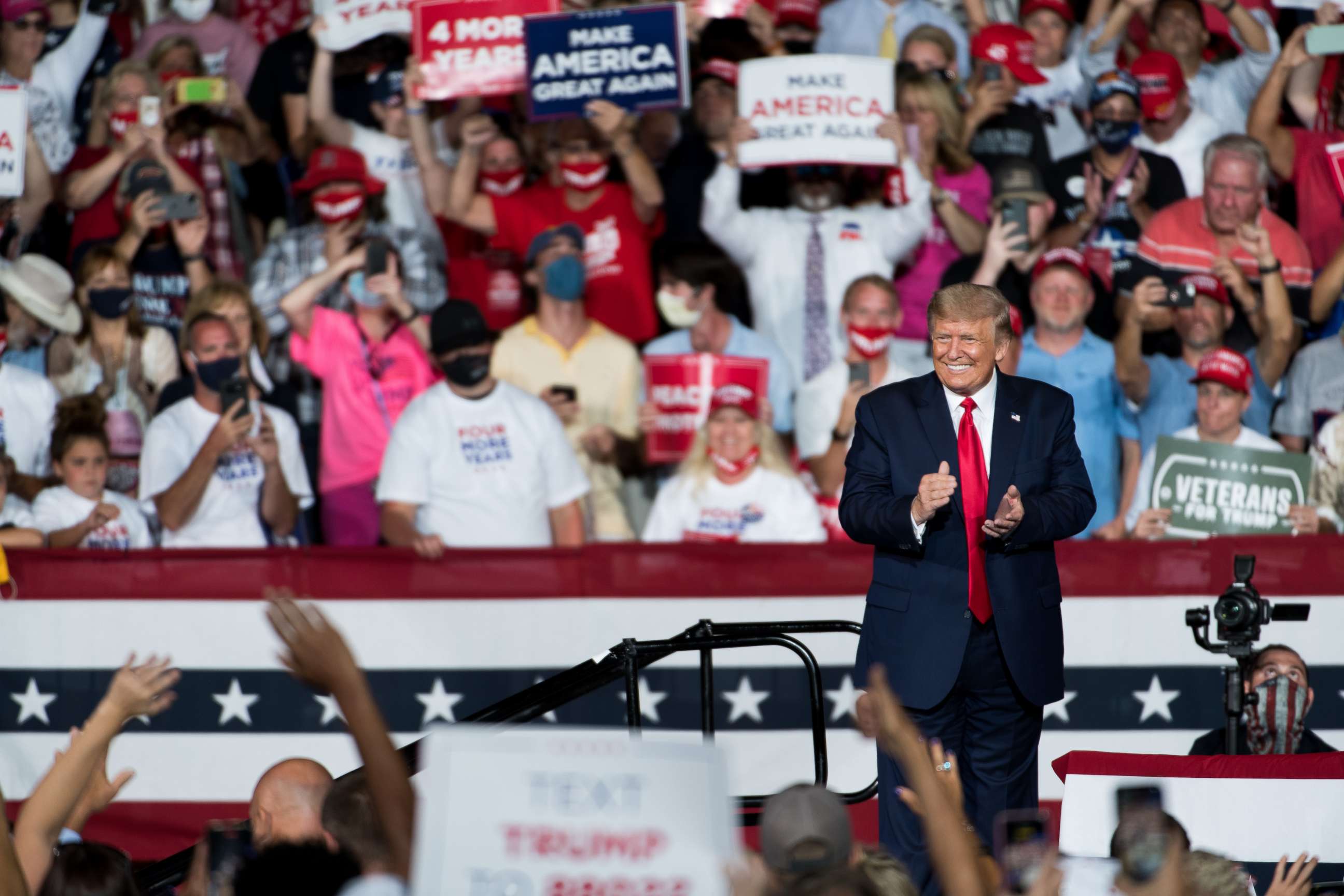 PHOTO: President Donald Trump greets a crowd during a campaign rally at Smith Reynolds Airport on Sept. 8, 2020, in Winston Salem, N.C.