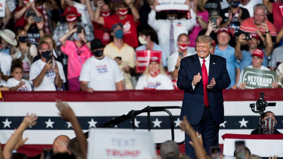 PHOTO: President Donald Trump greets a crowd during a campaign rally at Smith Reynolds Airport on Sept. 8, 2020, in Winston Salem, N.C.