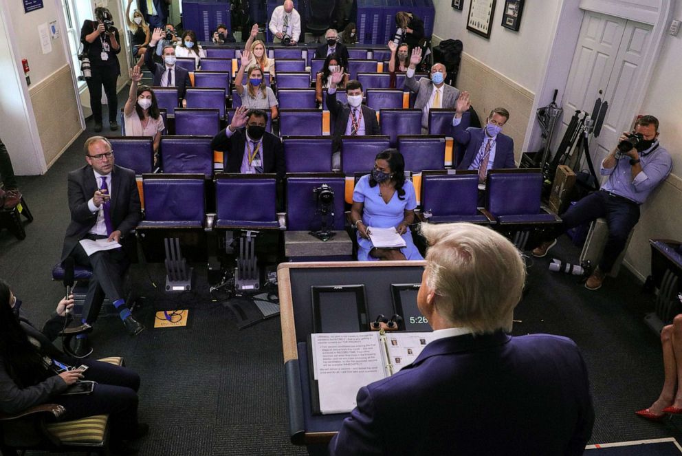 PHOTO: President Donald Trump listens to a question from ABC News reporter Jonathan Karl during a coronavirus disease (COVID-19) response news briefing at the White House, July 21, 2020.