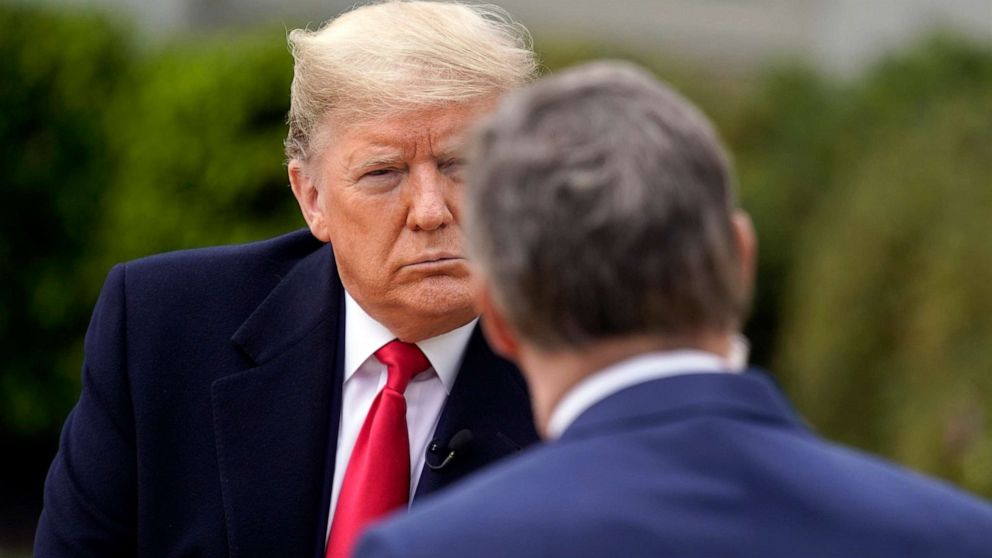 PHOTO: President Donald Trump speaks with Fox News Channel Anchor Bill Hemmer during a virtual town hall, at the White House, March 24, 2020.