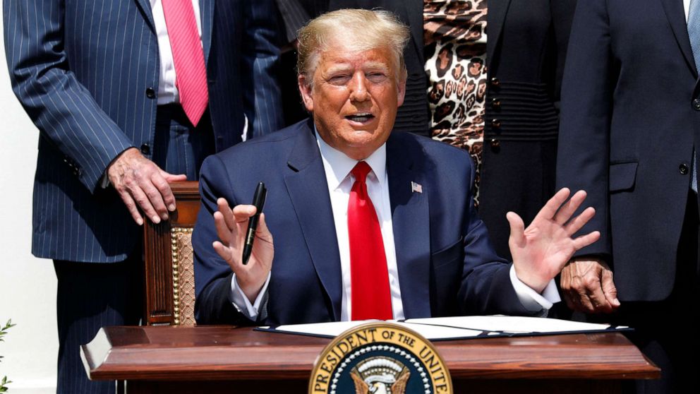 PHOTO: President Donald Trump declines to answers questions form journalists before signing H.R. 7010 - PPP Flexibility Act of 2020 in the Rose Garden of the White House in Washington on June 5, 2020.