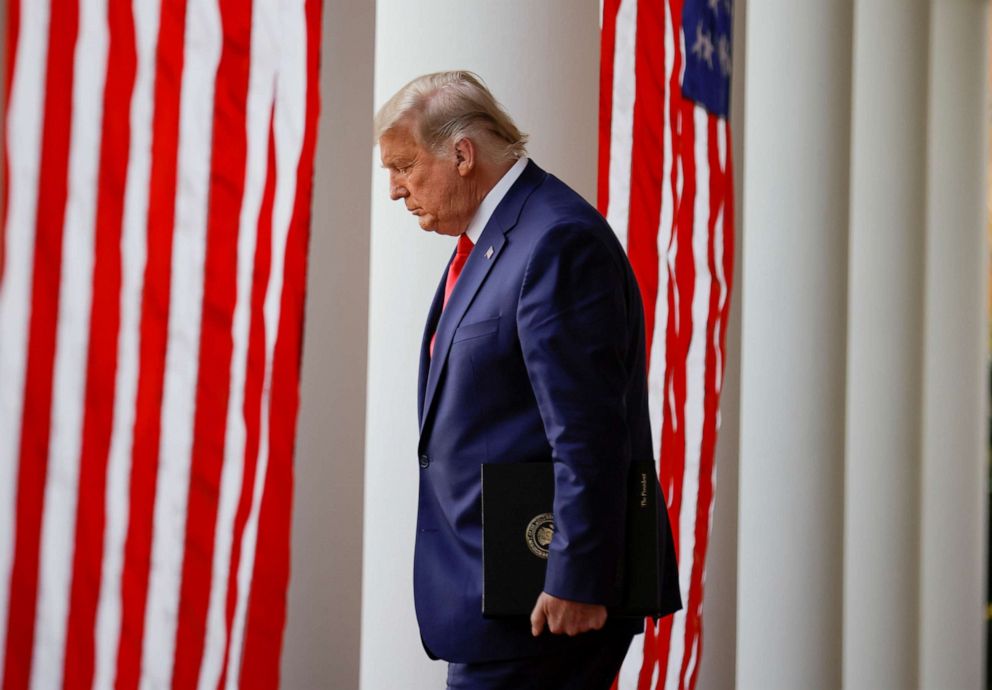 PHOTO: President Donald Trump walks down the West Wing colonnade from the Oval Office to the Rose Garden to deliver an update on the so-called "Operation Warp Speed" program at the White House in Washington, D.C., Nov. 13, 2020.