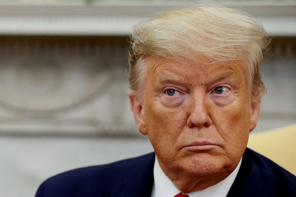 PHOTO: President Donald Trump listens to questions while meeting with Ecuador's President Lenin Moreno in the Oval Office of the White House in Washington, Feb. 12, 2020.