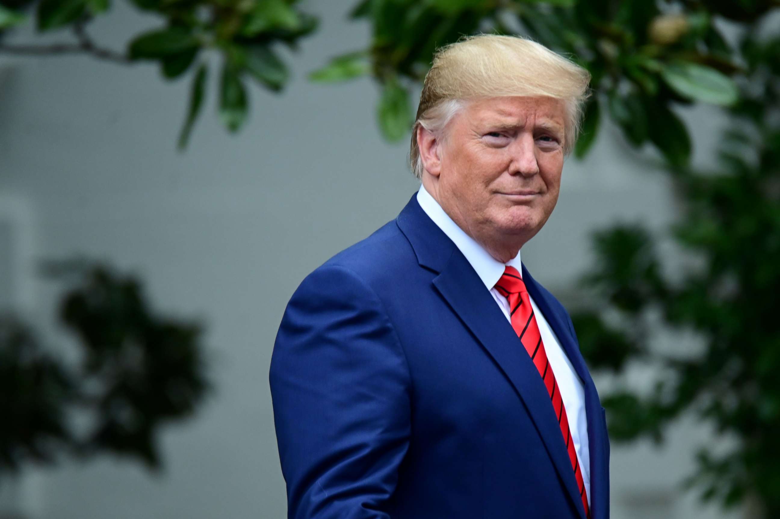 PHOTO: U.S. President Donald Trump arrives for a photo opportunity with sheriffs from across the country on the South Lawn of the White House in Washington, U.S., September 26, 2019.