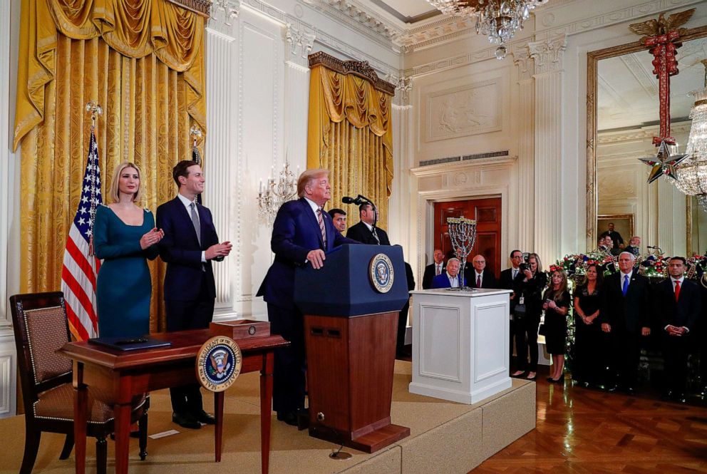 PHOTO: President Donald Trump is applauded prior to signing an executive order regarding combating anti-Semitism on U.S. college campuses during a Hanukkah reception in the East Room of the White House in Washington, Dec. 11, 2019.